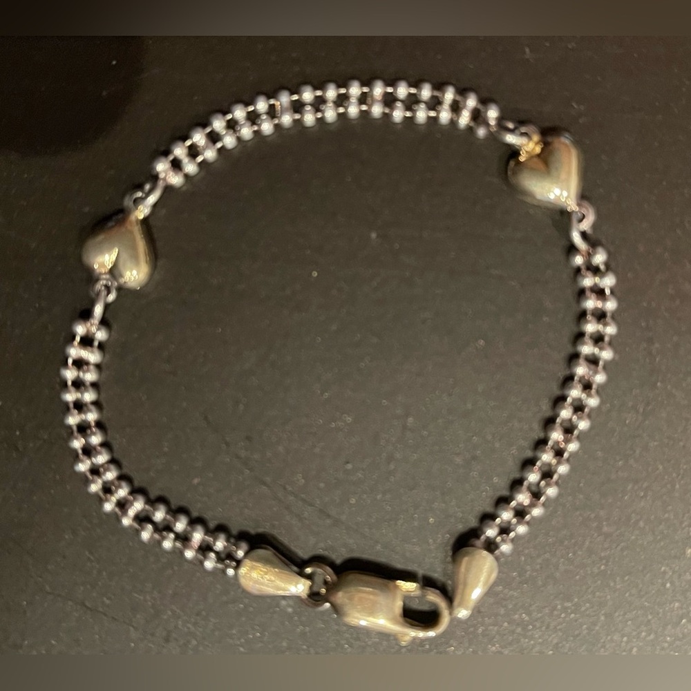 Silver (925) marked Heart Bracelet - Hearts appear to be gold / gold plated.